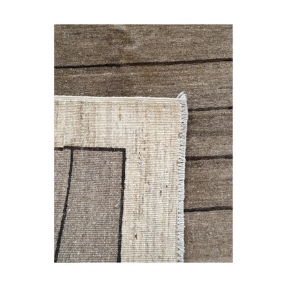 Back corner detail of Afghan Gabbeh hand-knotted wool rug showing reverse weave, cream border and natural wool structure, 166 x 106 cm