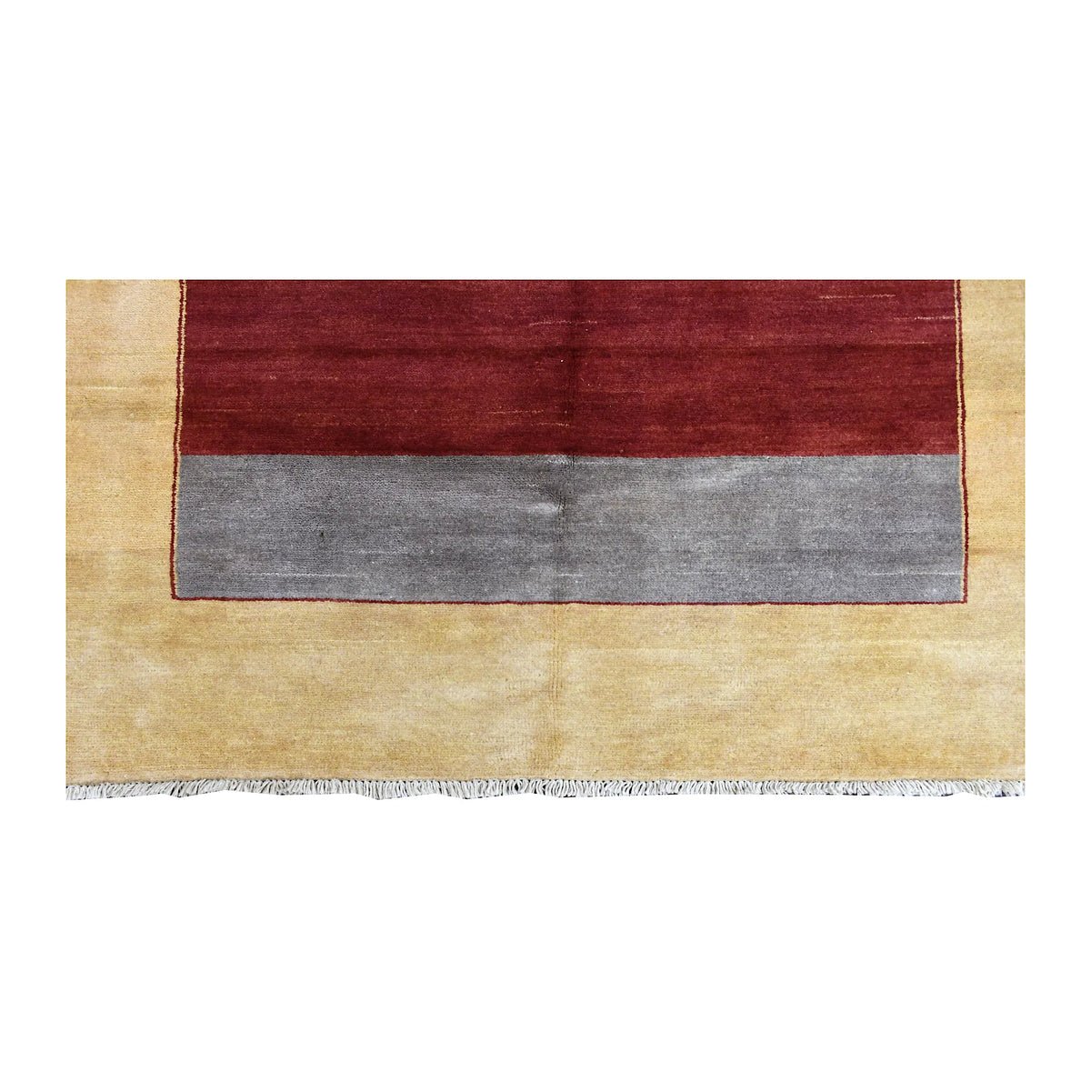 Fringe and end-border detail of Afghan Gabbeh rug with golden-beige wool, grey band and red stripe