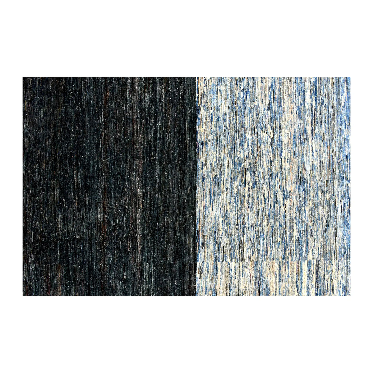 Close-up of the transition between dark navy and layered blue sections of the Gabbeh wool field