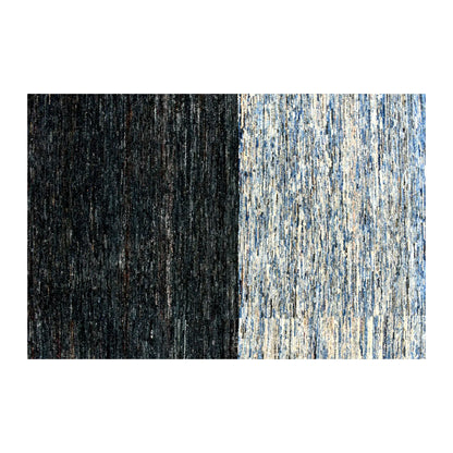 Close-up of the transition between dark navy and layered blue sections of the Gabbeh wool field