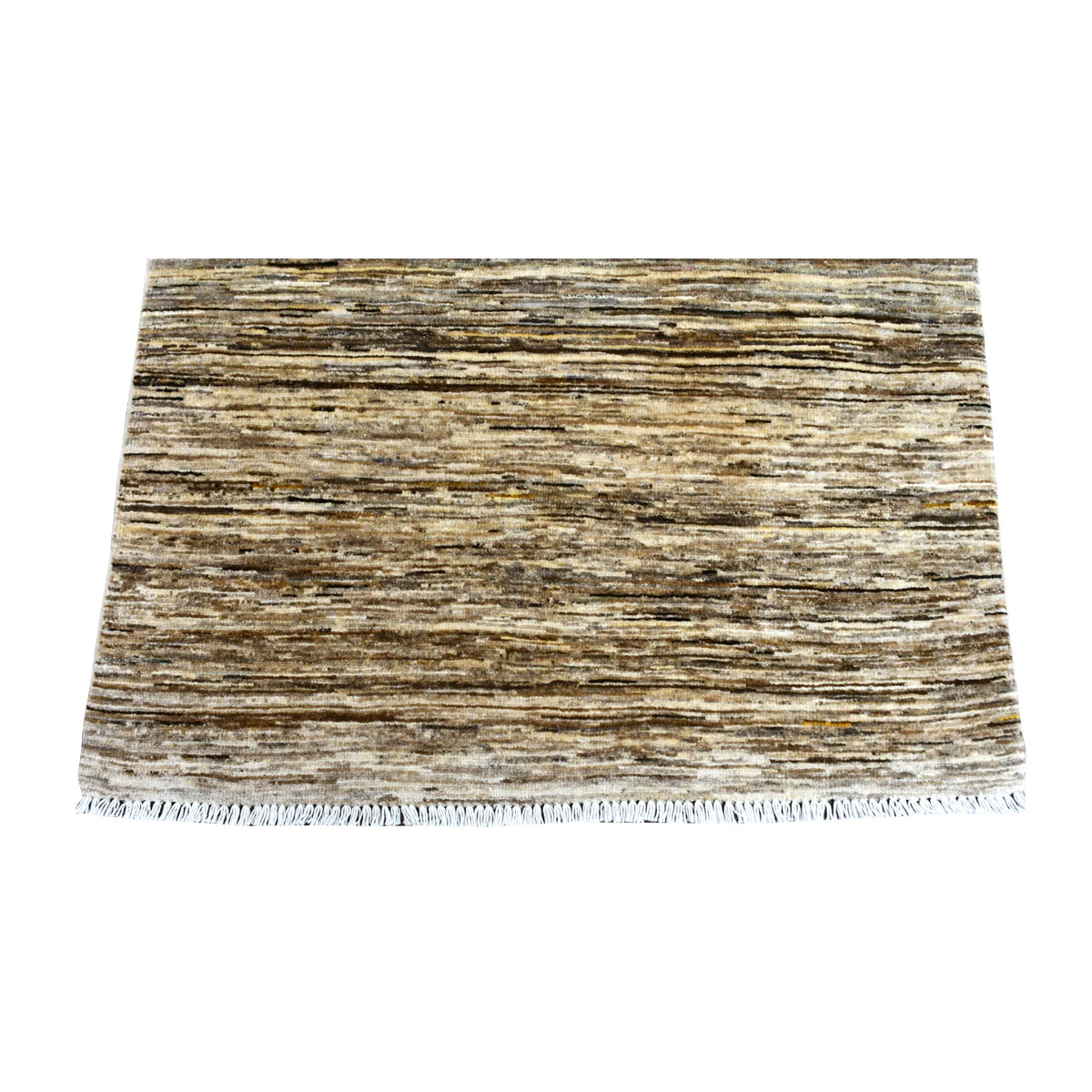 Fringe and end detail of Afghan Gabbeh rug with layered brown, beige and ivory horizontal striations