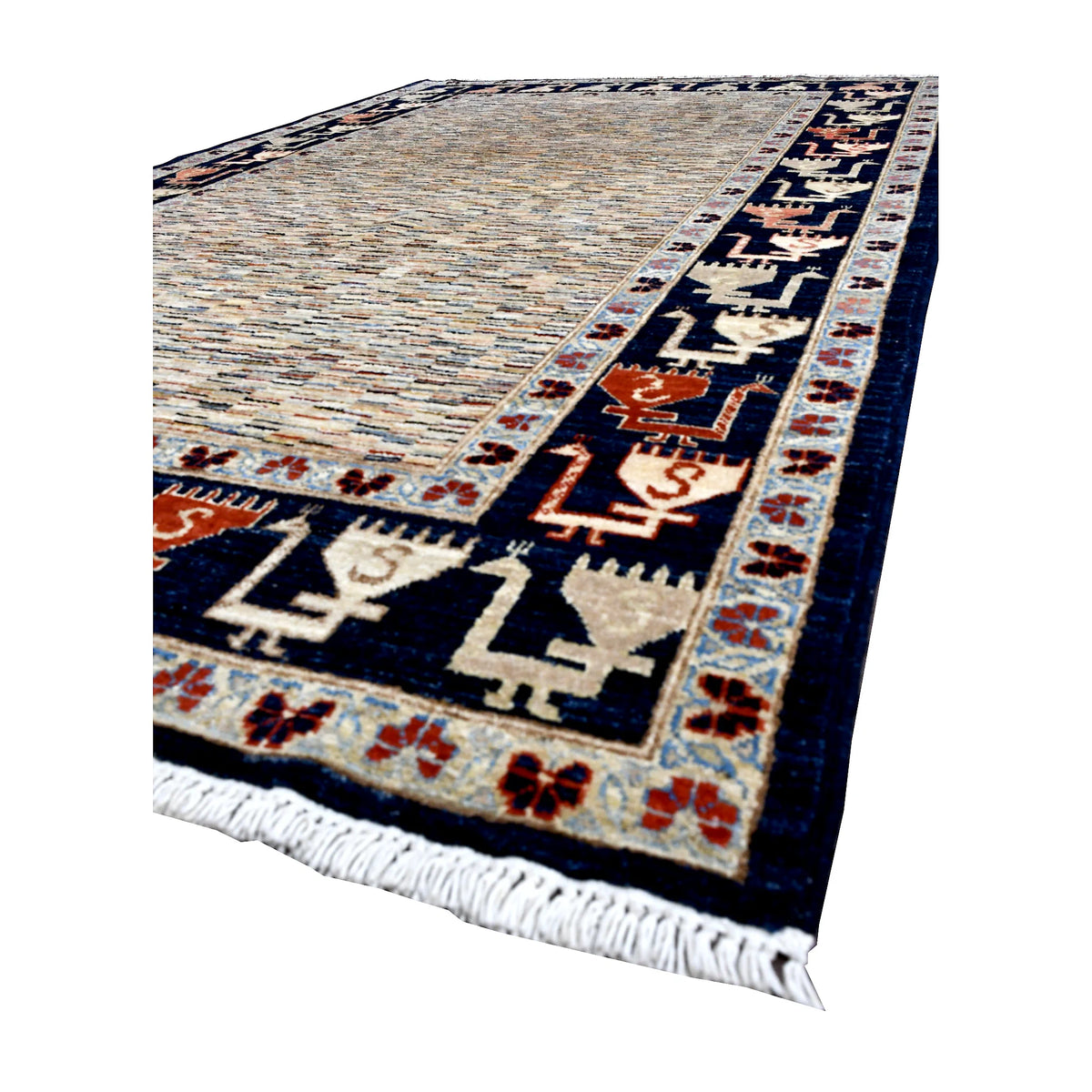 Angled view of Afghan Gabbeh wool rug showing its multicolour striated field, navy border and pale fringe