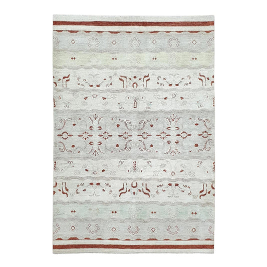 Full view of Afghan Gabbeh hand-knotted wool rug with soft off-white field, pale mint bands and rust-red floral and geometric motifs, 250 x 168 cm