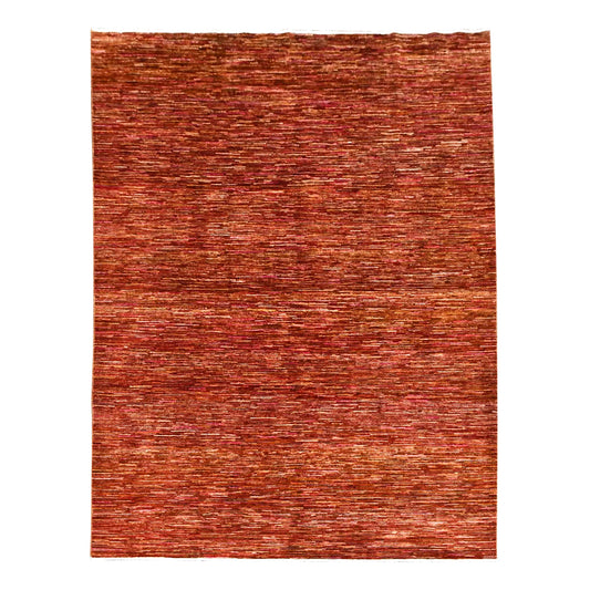 Full view of Afghan Gabbeh hand-knotted wool rug with a rust-red tonal field, 288 x 200 cm
