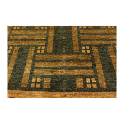 Border pattern detail of Afghan Gabbeh hand-knotted wool rug with green lattice design and brown edge
