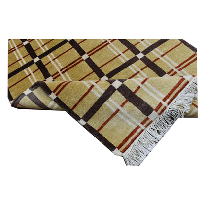 Folded Afghan Gabbeh wool rug showing corner detail and hand-knotted texture