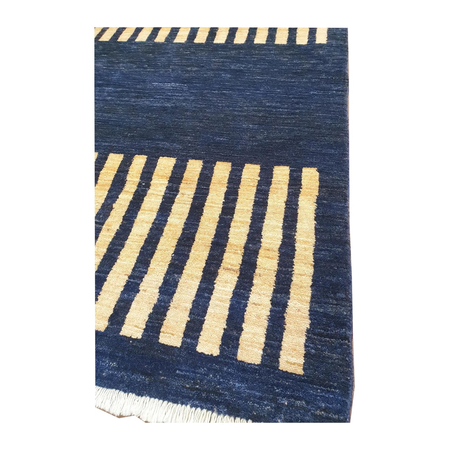 Corner-edge detail of Afghan Gabbeh wool rug with navy field and beige stripes, 149 x 95 cm