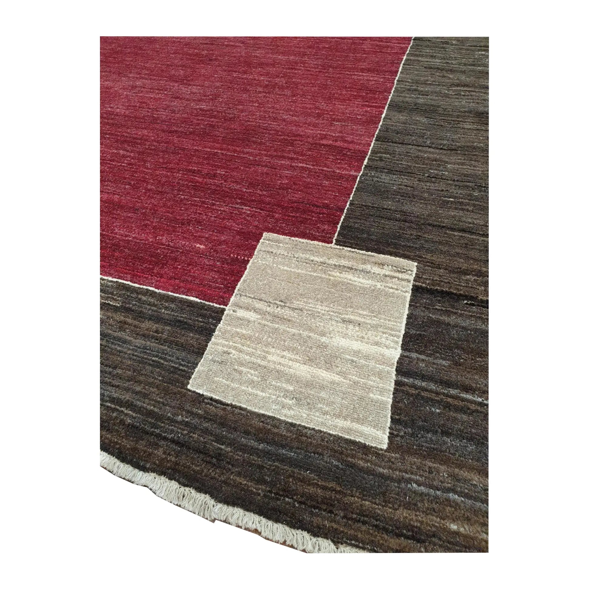 Corner and fringe detail of Afghan Gabbeh wool rug showing off-white corner motif and charcoal-brown border, 243 x 162 cm