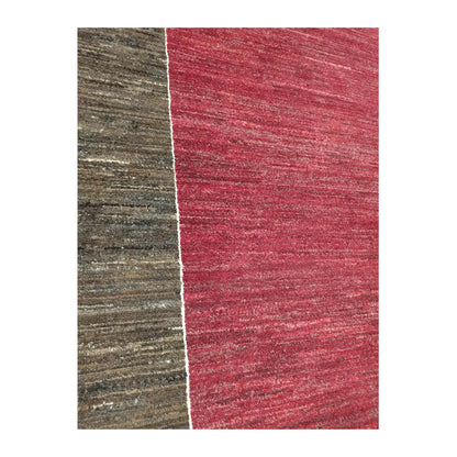 Field and border detail of Afghan Gabbeh wool rug showing red and charcoal-brown hand-knotted texture, 243 x 162 cm