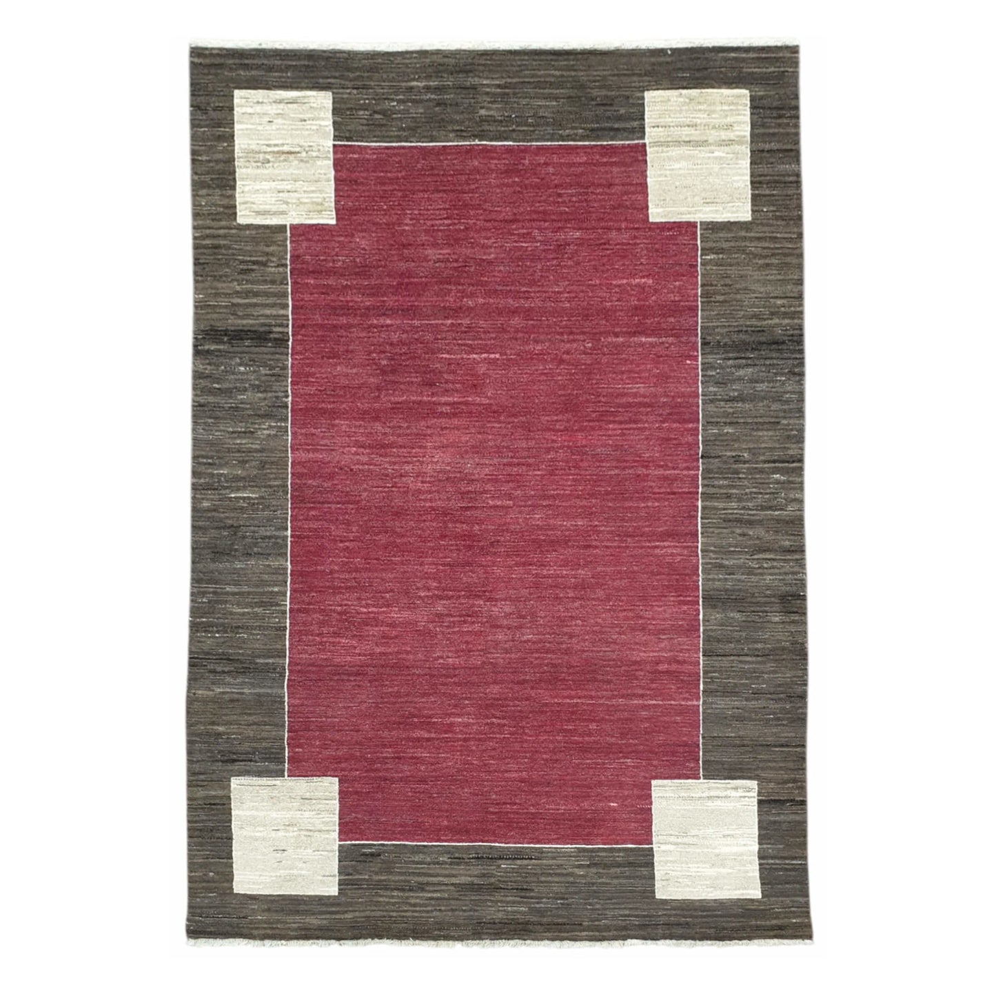 Full view of Afghan Gabbeh hand-knotted wool rug with red field, charcoal-brown border and off-white corner motifs, 243 x 162 cm