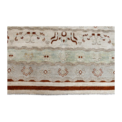 End-border detail of Afghan Gabbeh wool rug with pale mint bands, geometric motifs and rust-red border