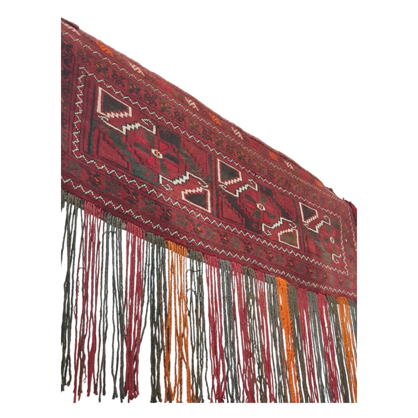 Full view of Afghan hand-knotted wool wall hanging with red tribal pattern and multi-colour tassels