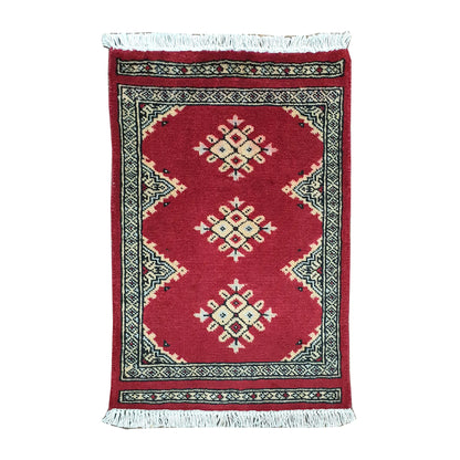 Afghan Jaldar wool rug 65 x 46 cm full view with red field, ivory diamond motifs and fringe