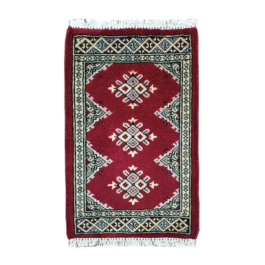 Afghan Jaldar wool rug 67 x 49 cm full view with red field, ivory diamond motifs and fringe