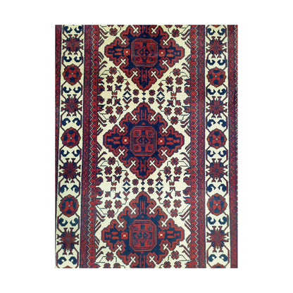 Central medallion field detail of Afghan Karghai runner rug with repeated burgundy motifs and ivory ground