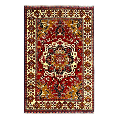 Full view of Afghan Karghai hand-knotted wool rug with deep red field, central medallion, ochre corners and ivory border, 281 x 200 cm