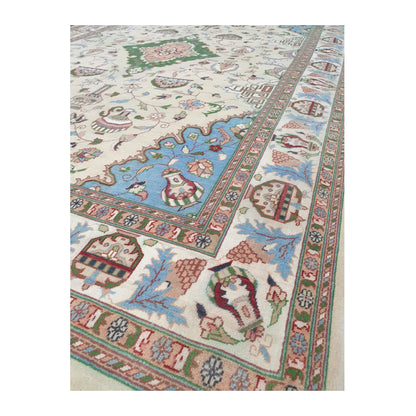 Border detail of Afghan Karghai wool rug with floral motifs and pale blue accents, 298 x 202 cm