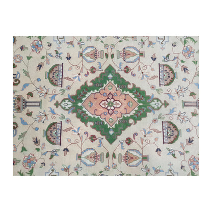 Central medallion detail of Afghan Karghai wool rug in green, blush pink and beige tones, 298 x 202 cm