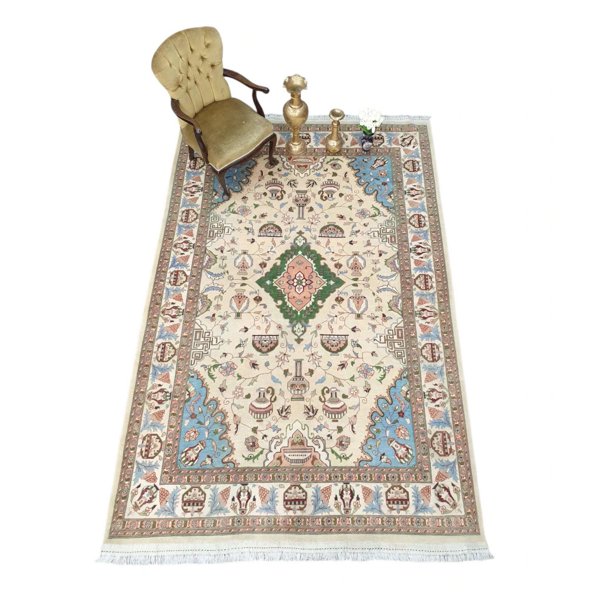 Lifestyle view of Afghan Karghai wool rug with beige field and blue-green borders, 298 x 202 cm