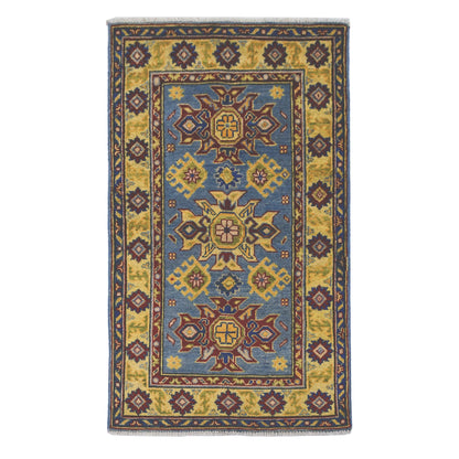 Full view of Afghan Kazak hand-knotted wool rug with light blue field, geometric medallions and detailed border, 135 x 81 cm