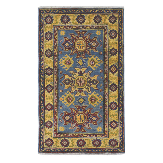 Full view of Afghan Kazak hand-knotted wool rug with light blue field, geometric medallions and detailed border, 135 x 81 cm
