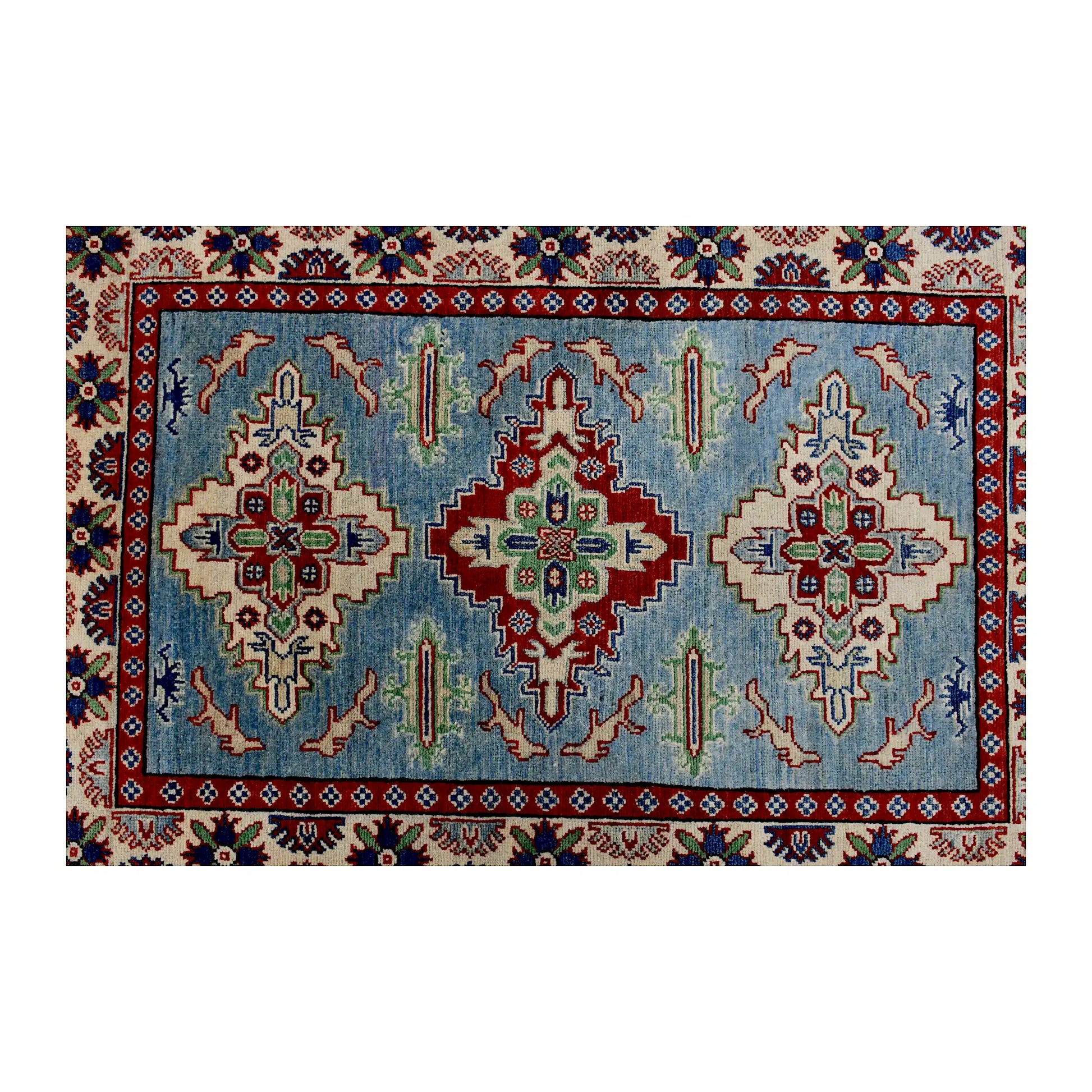 Full design detail of Afghan Kazak hand-knotted wool rug showing three geometric medallions on a light blue field