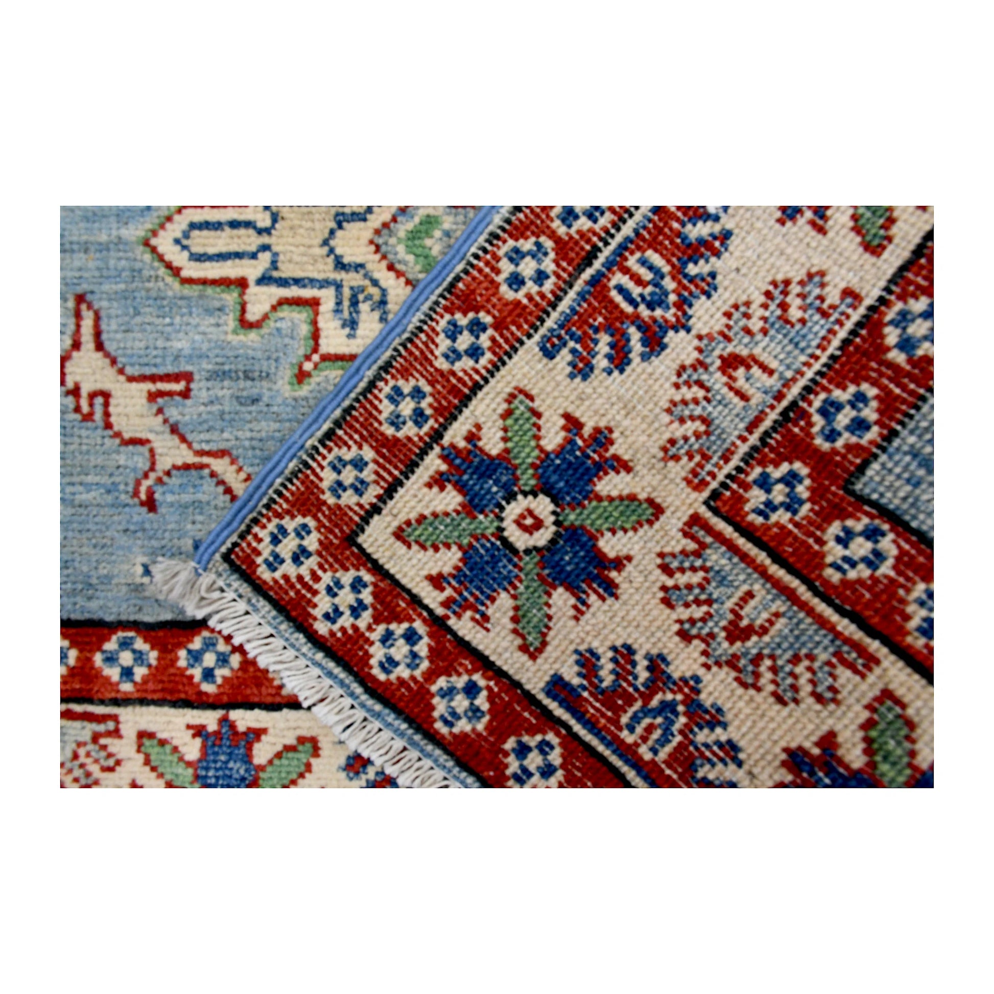 Reverse-weave detail of Afghan Kazak hand-knotted wool rug showing the back structure, pattern and weave