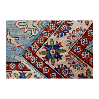 Reverse-weave detail of Afghan Kazak hand-knotted wool rug showing the back structure, pattern and weave