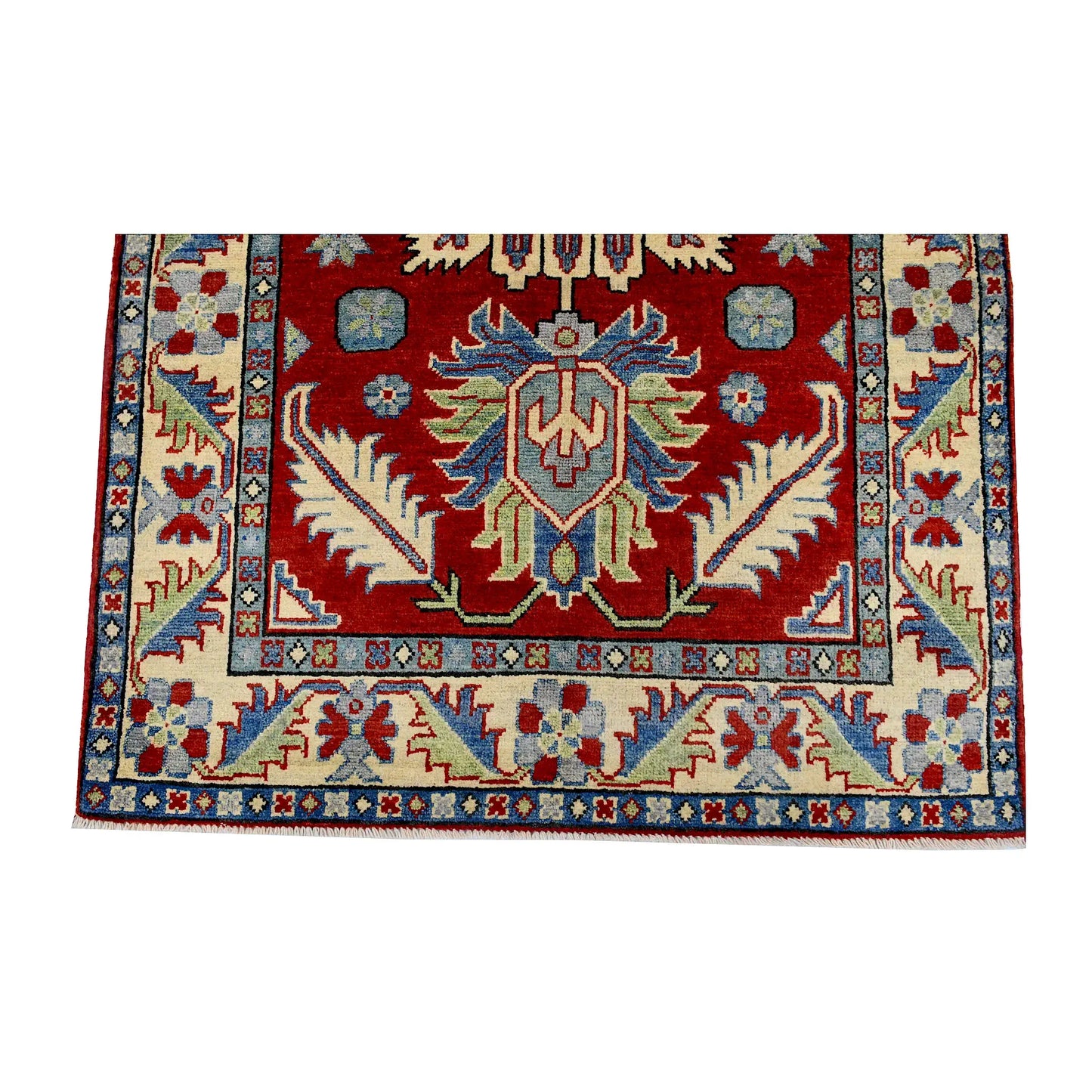 End medallion and border detail of Afghan Kazak hand-knotted wool rug showing red field, cream border and light blue accents