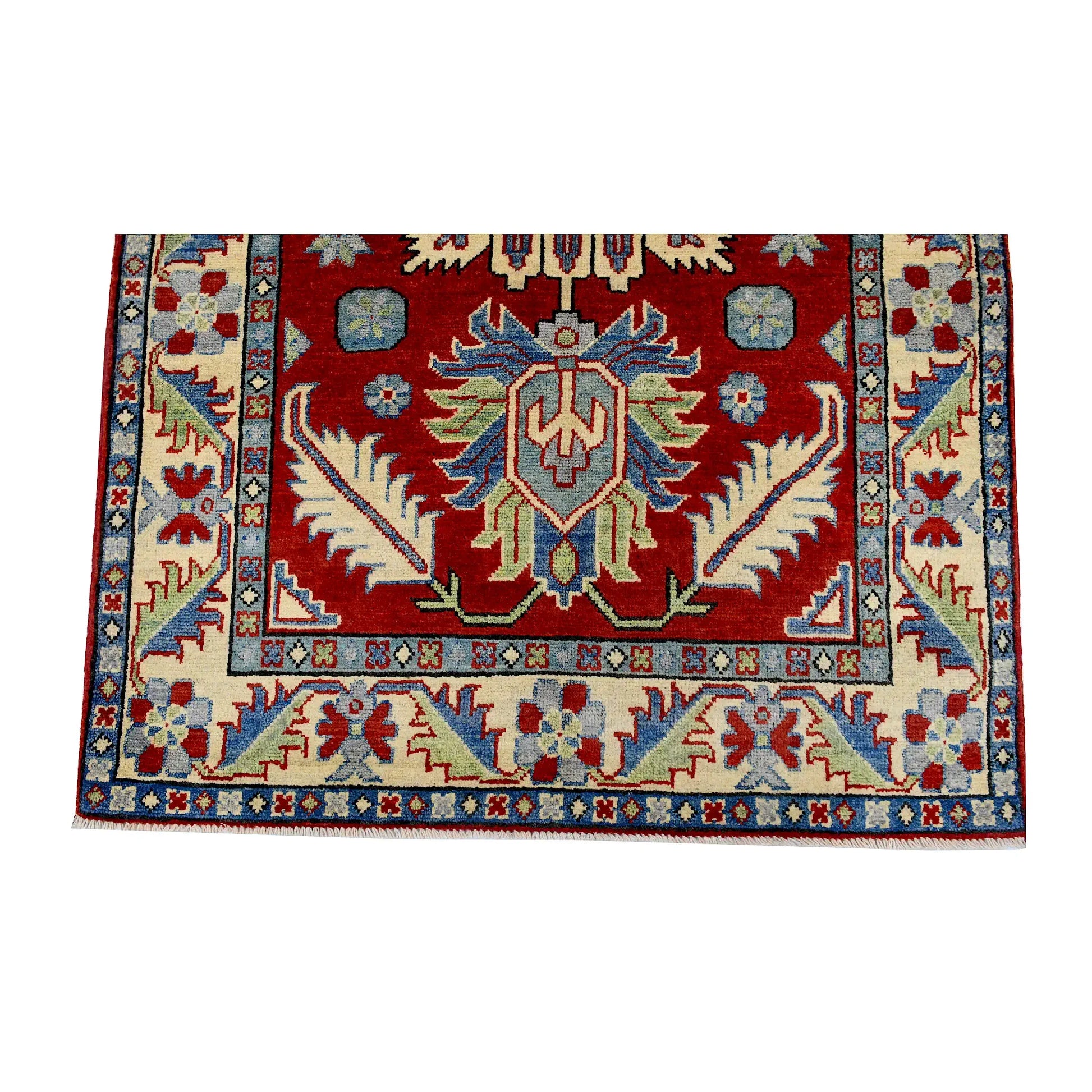 End medallion and border detail of Afghan Kazak hand-knotted wool rug showing red field, cream border and light blue accents