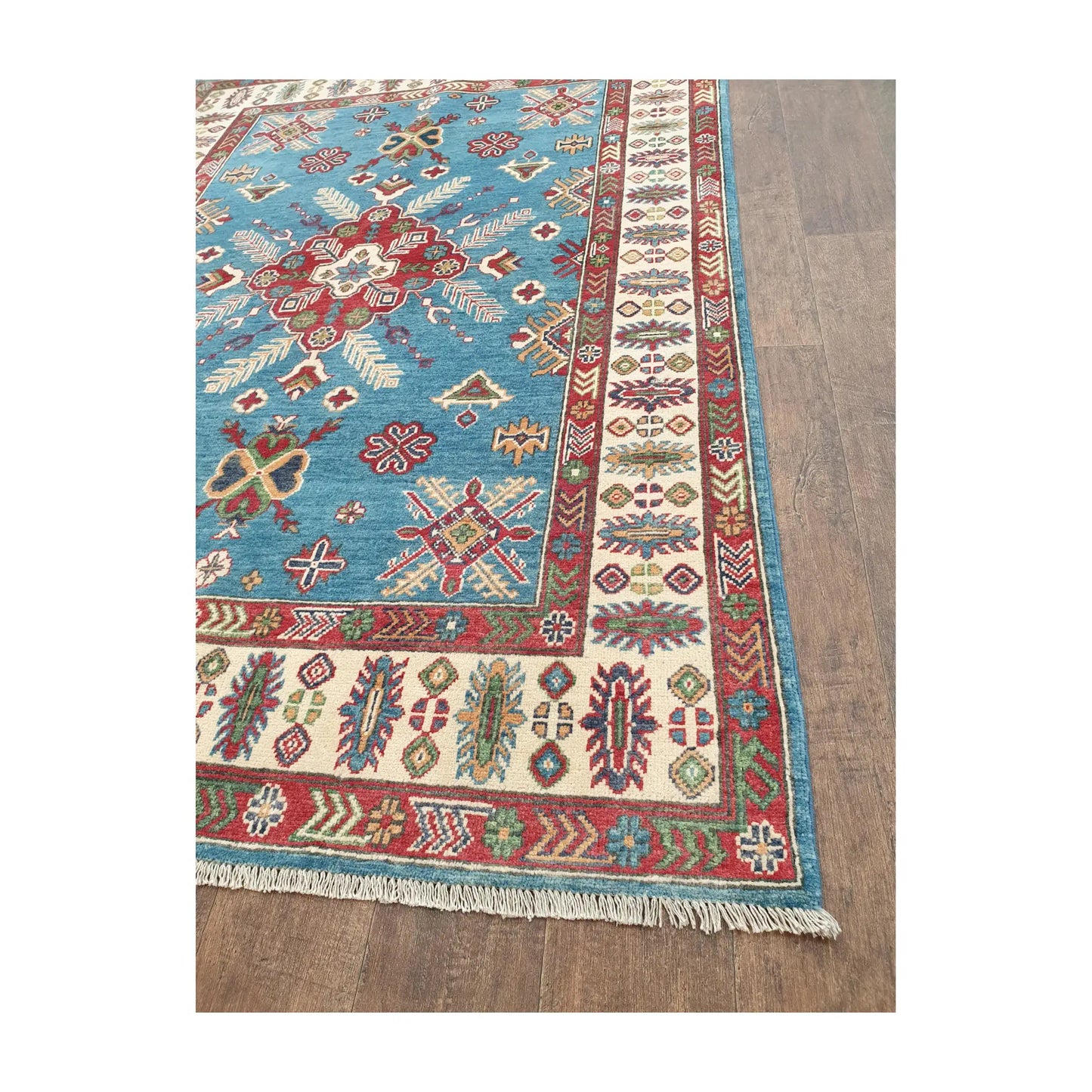 Border and fringe detail of Afghan Kazak hand-knotted wool rug with cream and red pattern