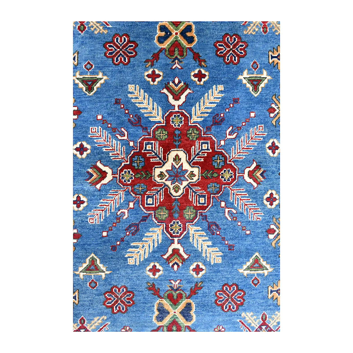 Central medallion detail of Afghan Kazak wool rug with red floral geometry, ivory star centre and green accents