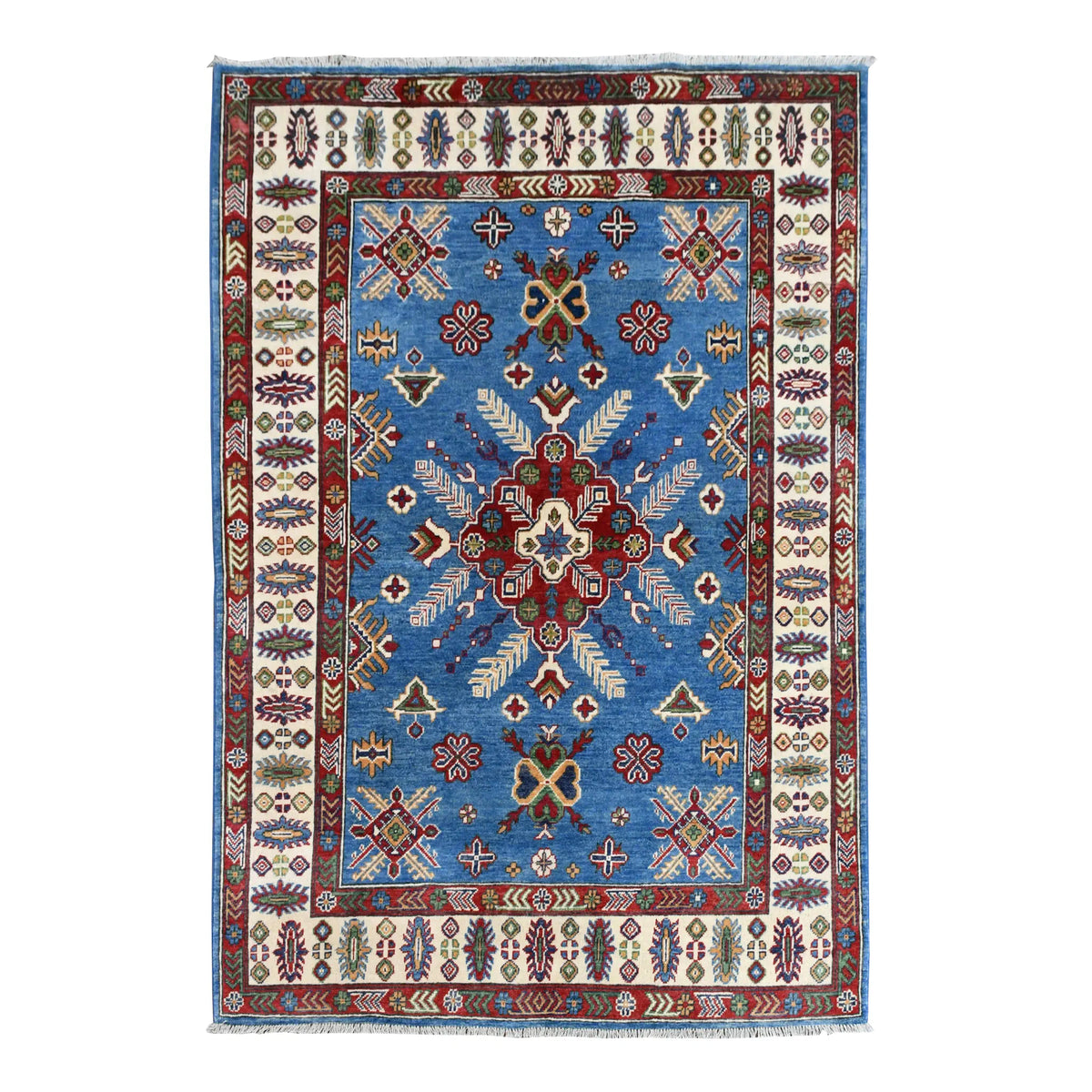 Full view of Afghan Kazak hand-knotted wool rug with sky-blue field, red star medallion and ivory border, 204 x 156 cm