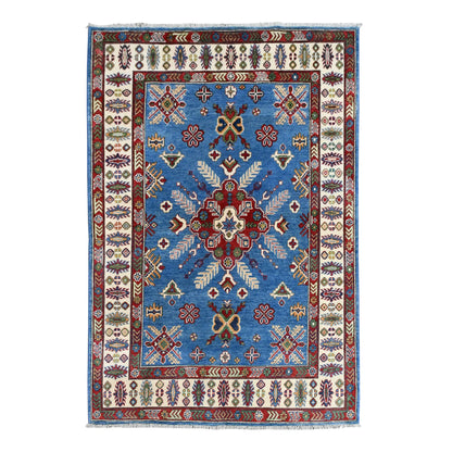 Full view of Afghan Kazak hand-knotted wool rug with sky-blue field, red star medallion and ivory border, 204 x 156 cm