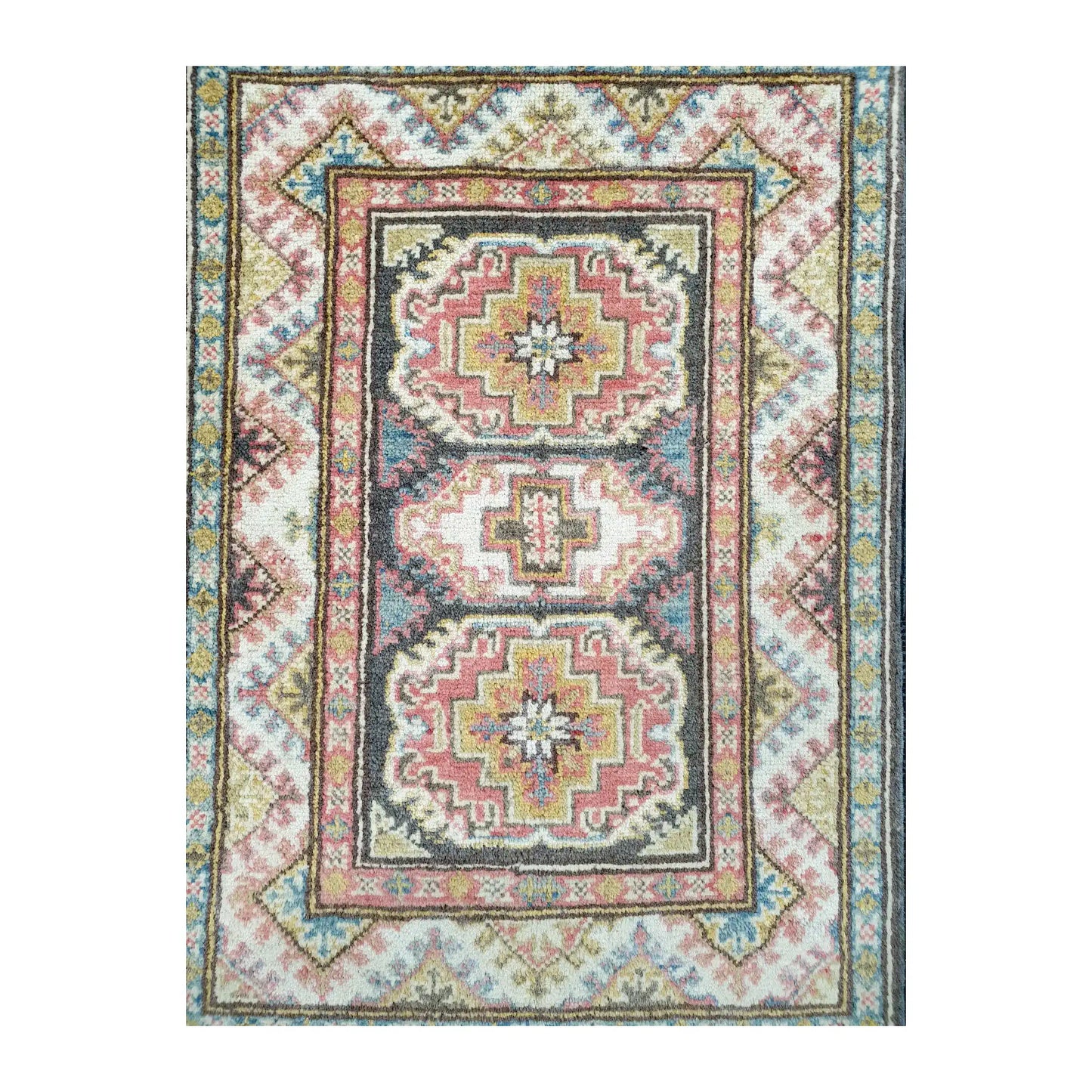 Front design view of Afghan Kazak hand-knotted wool rug showing three medallions, pale blue border detail and soft cream ground
