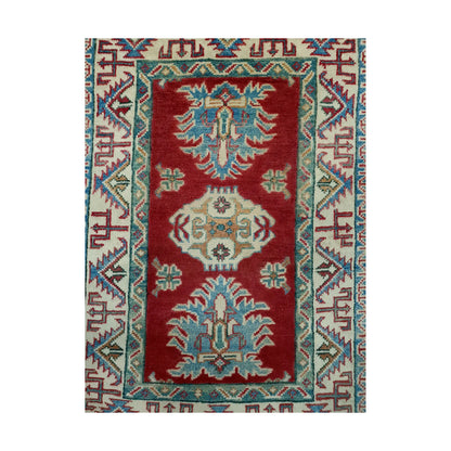 Front design view of Afghan Kazak hand-knotted wool rug showing red field, teal-blue motifs, ivory central detail and cream border