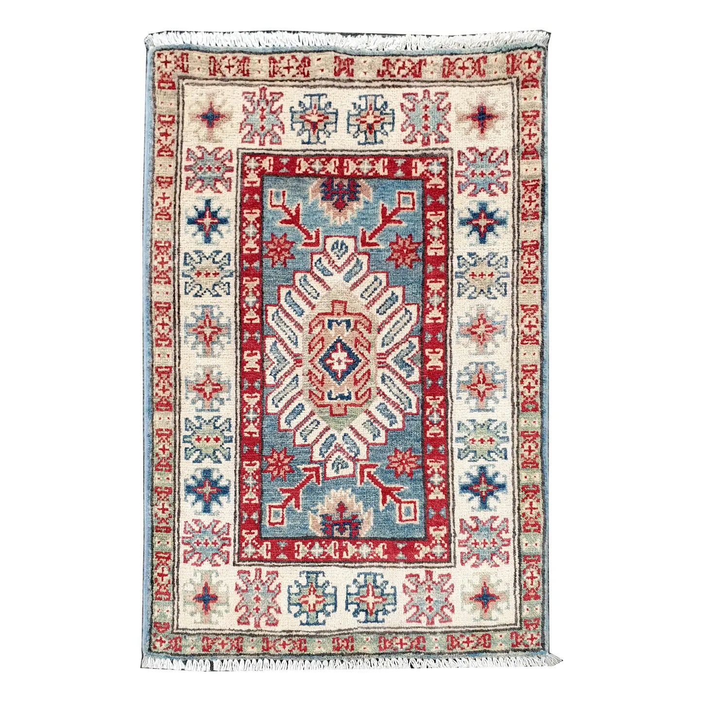 Full view of Afghan Kazak hand-knotted wool rug with blue field, off-white border and central geometric motif, 91 x 60 cm