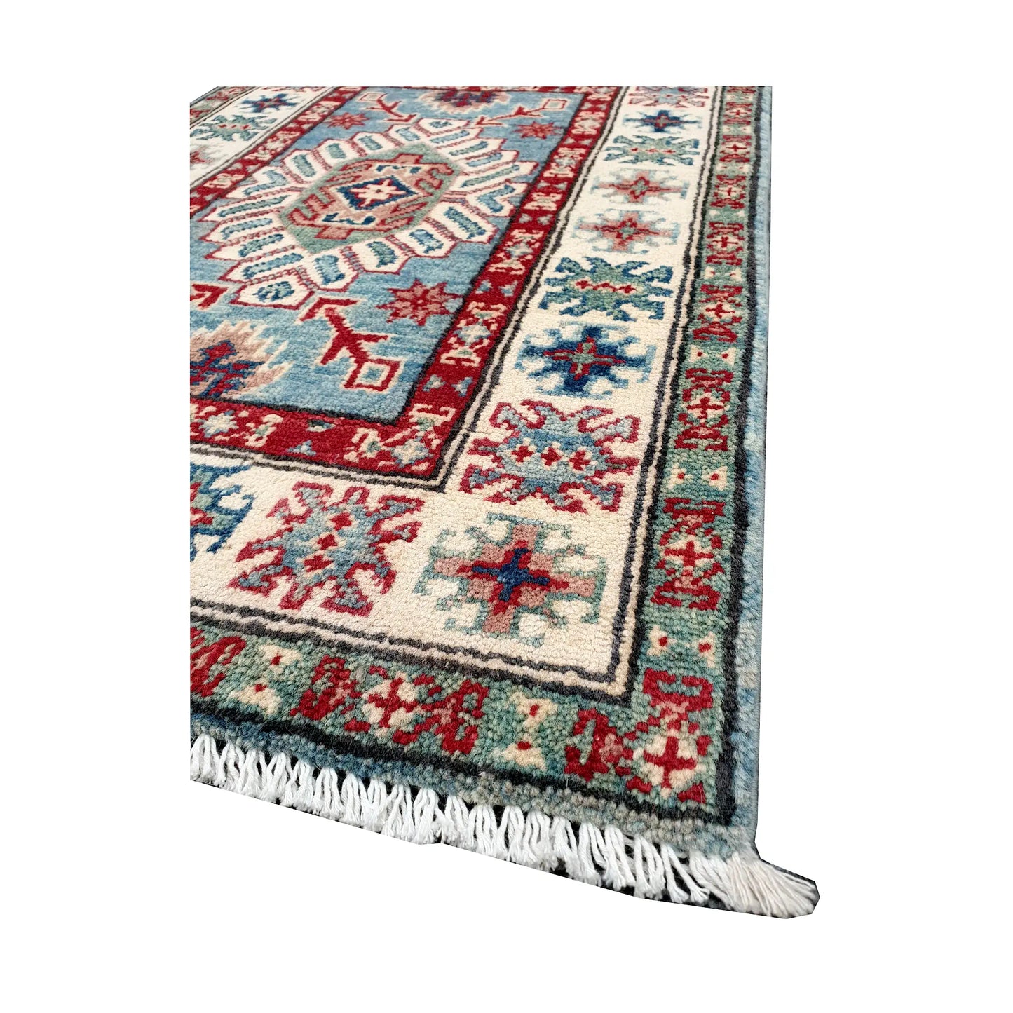 Angled corner and fringe view of Afghan Kazak wool rug showing blue field, off-white border, red detail and light fringe