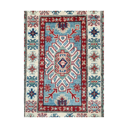 Front design view of Afghan Kazak hand-knotted wool rug showing central geometric motif, blue field and framed border