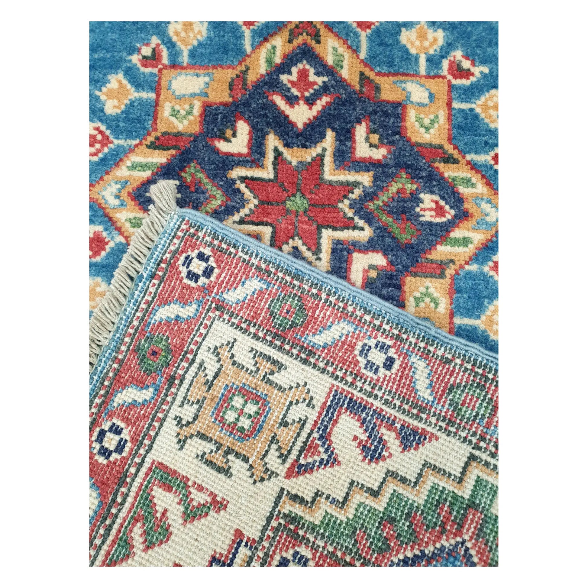 Corner detail of Afghan Kazak runner showing front pattern and reverse weave, 250 x 88 cm