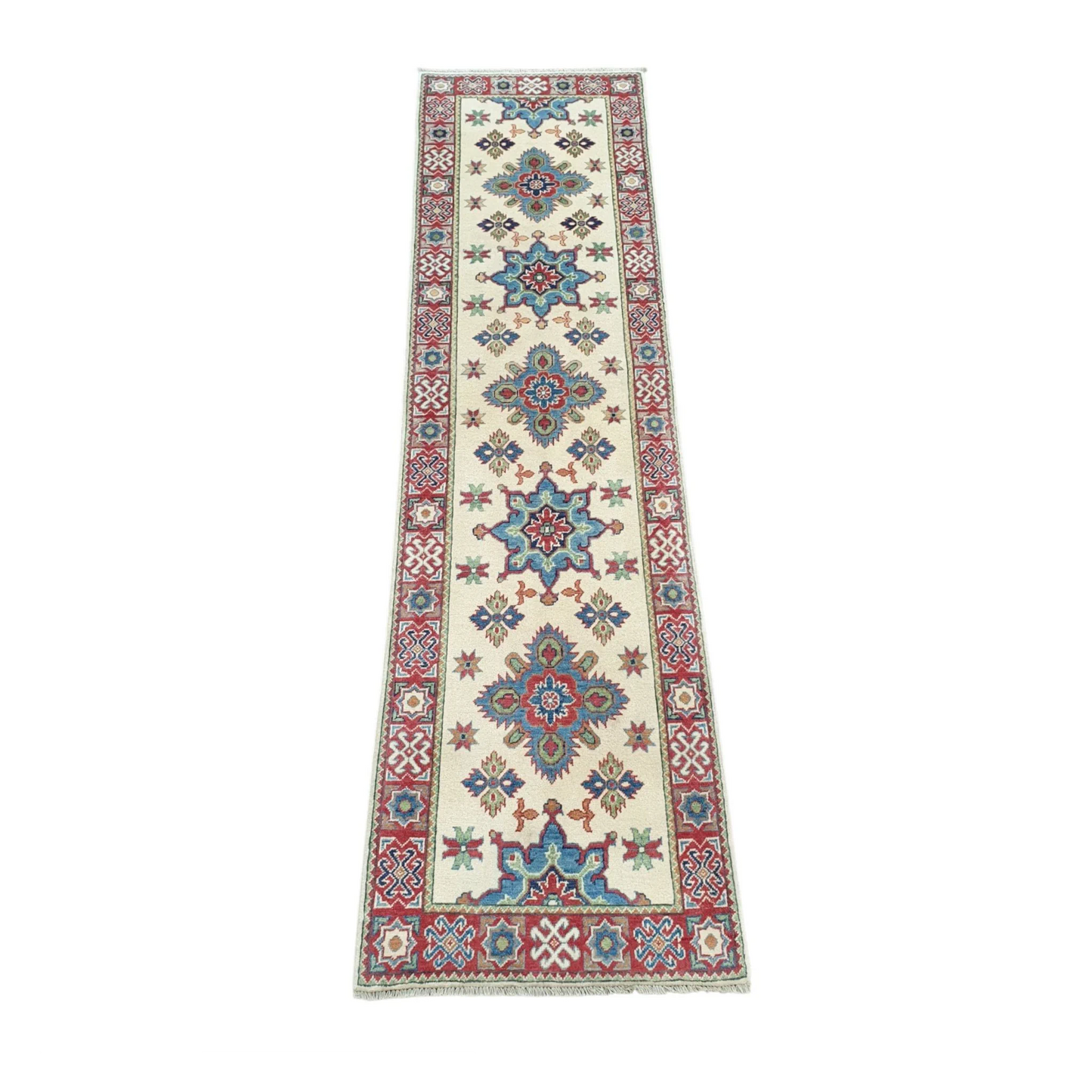 Angled full view of Afghan Kazak wool runner rug with colourful geometric medallions