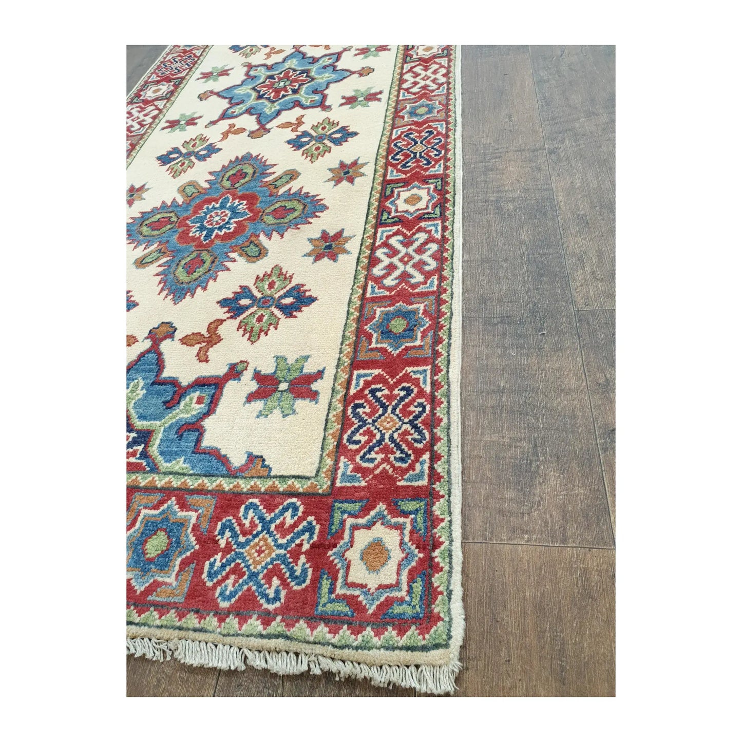 Border and fringe detail of Afghan Kazak hand-knotted wool runner rug