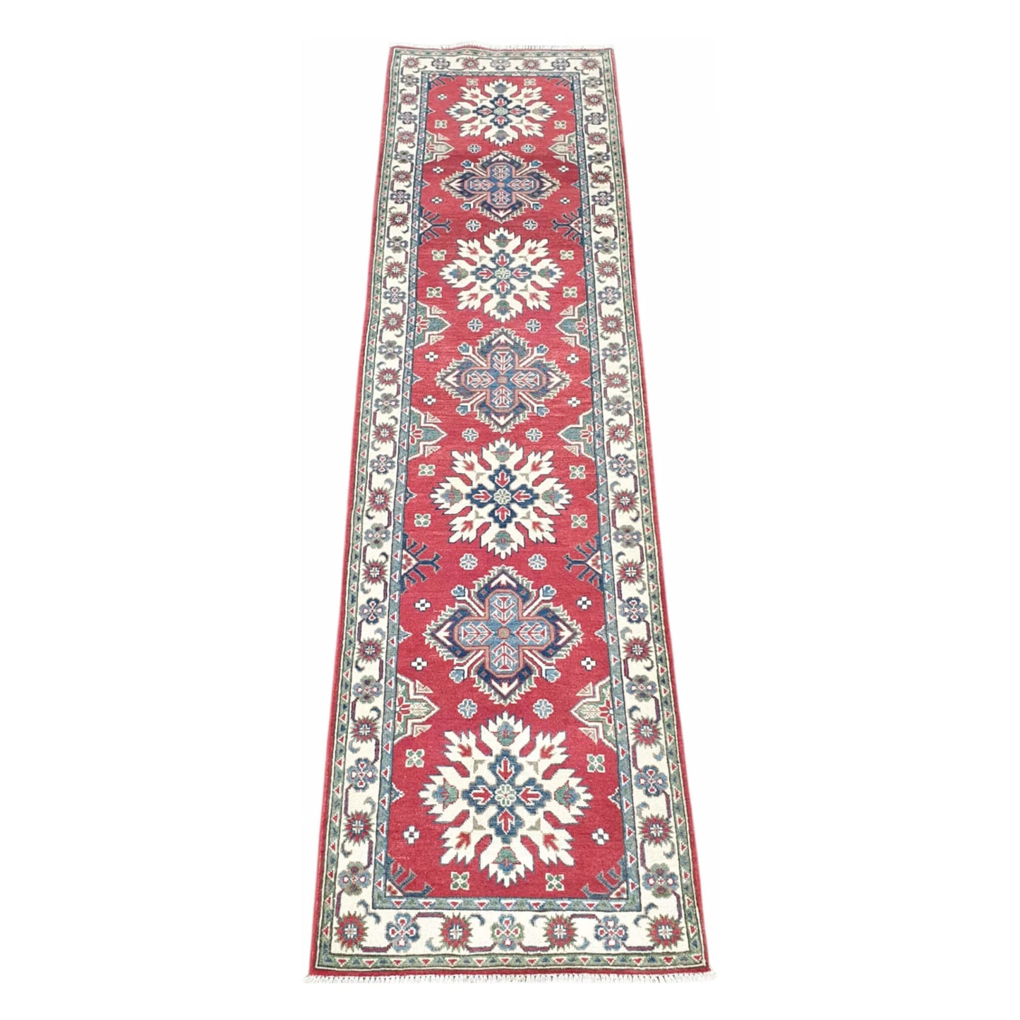 Afghan Kazak hand-knotted wool runner rug 300 x 81 cm shown in full view with red geometric medallion design