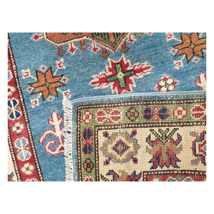Corner detail of Afghan Kazak runner showing front pattern and reverse weave, 358 x 97 cm
