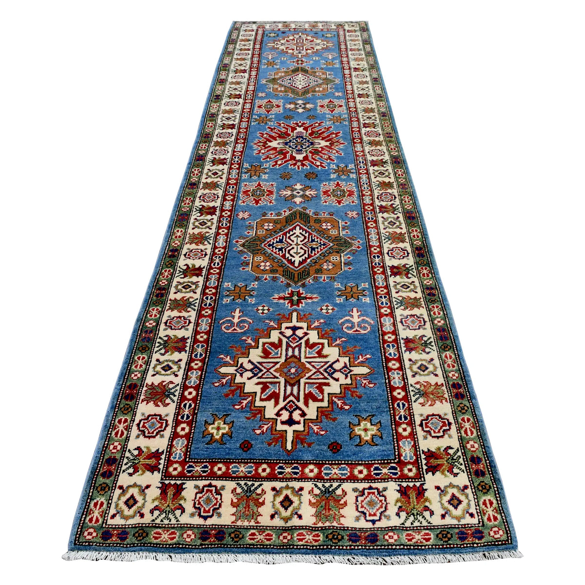 Full view of Afghan Kazak hand-knotted wool runner with geometric medallions on a sky-blue field, 358 x 97 cm