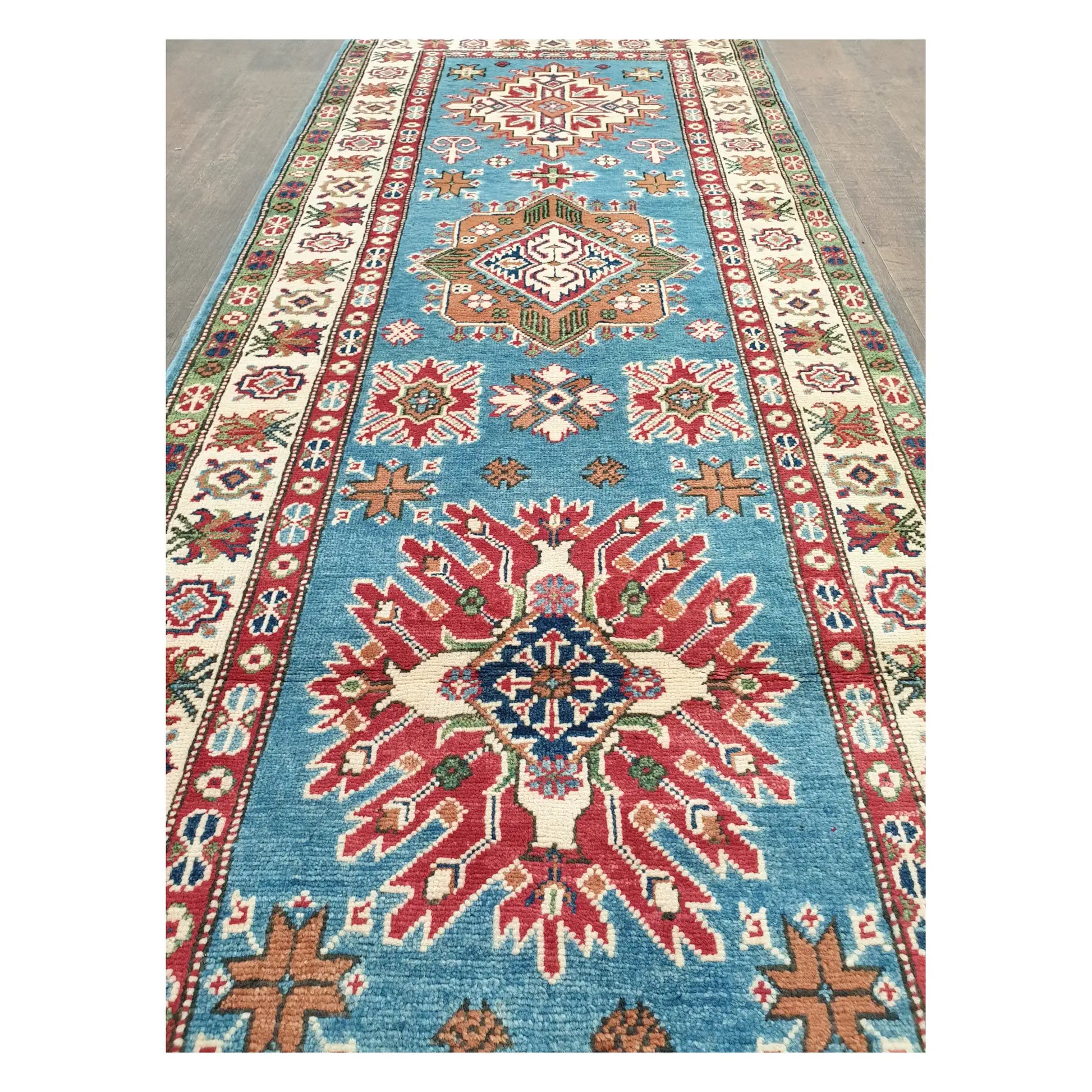 Detailed view of Afghan Kazak runner showing elongated geometric pattern and colourful border motifs, 358 x 97 cm
