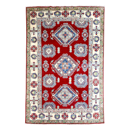 Full view of red Afghan Kazak rug with three blue and cream diamond medallions and a broad cream border, 298 x 196 cm