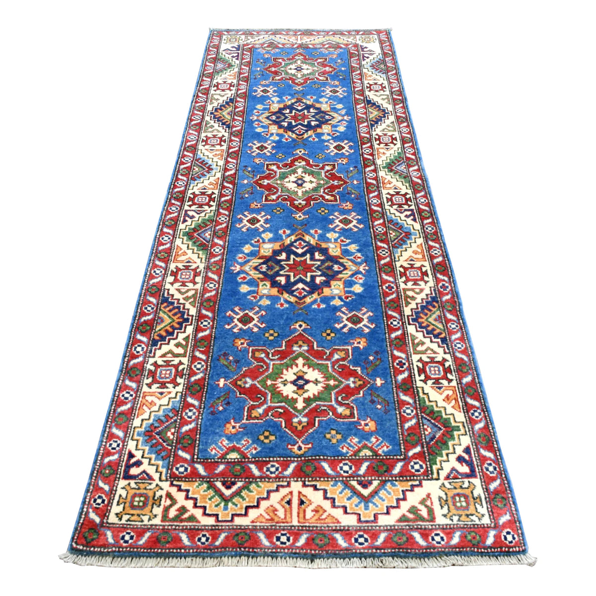 Full view of Afghan Kazak hand-knotted wool runner with blue field, red and navy geometric medallions and ivory border, 250 x 88 cm