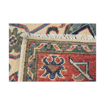 Reverse-corner detail of Afghan Kazak wool runner rug with fringe, 291 x 83 cm