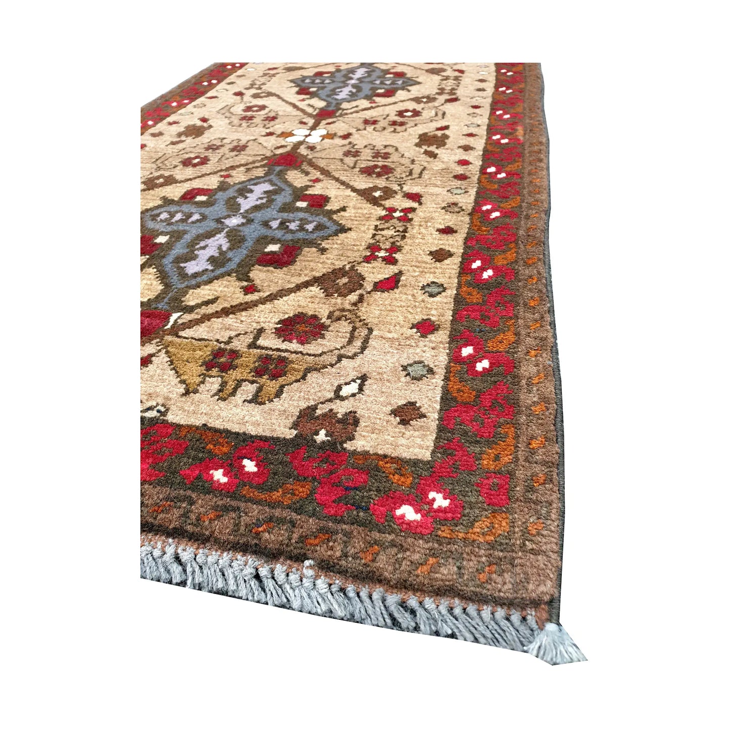 Angled corner and fringe view of Afghan Khal Mohammadi wool rug showing ivory field, red border, dark outline detail and light fringe